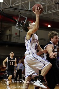 Otis-Bison Cougar Brandon Pechanec (#44) goes for a layup against the Ellsworth Bearcats during the 2012 Hoisington Winter Jam Basketball Tournament.