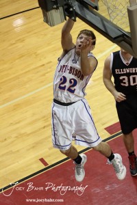 Otis-Bison Cougar Patrick Piper (#22) goes up for a layup agains the Ellsworth Bearcats during the 2012 Hoisington Winter Jam Basketball Tournament.