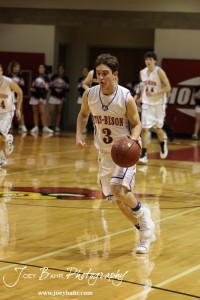Otis-Bison Cougar Trevor Keller (#3) drives the ball down the court against the Ellsworth Bearcats at the 2012 Hoisington Winter Jam Basketball Tournament.