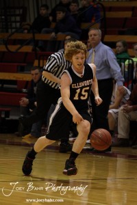 Ellsworth Bearcat Clint Glaser (#15) makes a fast break down the court against the Otis-Bison Cougars at the 2012 Hoisington Winter Jam Basketball Tournament.