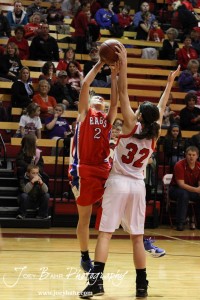 HWJ_Ellinwood_vs_Hoisington_Girls_1-20-12_0011 Ellinwood Lady Eagle Sophie Hayes (#2) tries to shoot over Hoisington Lady Cardinal Mallory Flagor (#32) at the 2012 Hoisington Winter Jam Basketball Tournament.