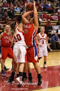 HWJ_Ellinwood_vs_Hoisington_Girls_1-20-12_0058 Ellinwood Lady Eagle Kelsea Ward (#20) takes a shot against the defense of Hoisington Lady Cardinal Jordin Greer (#10) at the 2012 Hoisington Winter Jam Basketball Tournament.