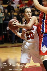HWJ_Ellinwood_vs_Hoisington_Girls_1-20-12_0084 Brandy Wondra (#20) of the Hoisington Lady Cardinals tries to pass around a Ellinwood Lady Eagles defender at the 2012 Hoisington Winter Jam Basketball Tournament.
