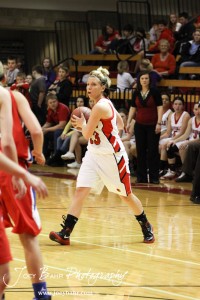 HWJ_Ellinwood_vs_Hoisington_Girls_1-20-12_0116 Blakelee Cooper (#23) of the Hoisington Lady Cardinals looks to make a pass against the Ellinwood Lady Eagles at the 2012 Hoisington Winter Jam Basketball Tournament.