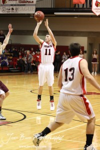 Mark Cunningham (#11) of the Ellsworth Bearcats takes a shot against the Victoria Knights at the 2012 Hoisington Winter Jam Basketball Tournament.