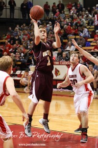 Victoria Knight Corey Dinkel  (#2) takes a shot against the Ellsworth Bearcats at the 2012 Hoisington Winter Jam Basketball Tournament.