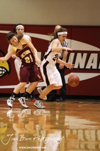 Connor Davis (#20) of the Ellsworth Lady Bearcats steals the ball away from the Victoria Lady Knights at the 2012 Hoisington Winter Jam Basketball Tournament.