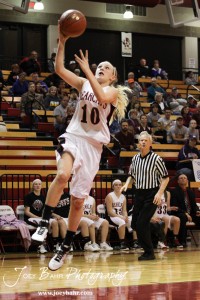 Halle Connally (#10) of the Ellsworth Lady Bearcats goes up for a layup against the Victoria Lady Knights at the 2012 Hoisington Winter Jam Basketball Tournament.