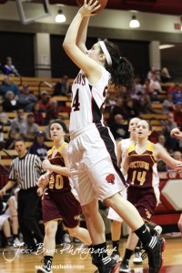 Ellsworth Lady Bearcat Whitney Williams (#24) goes up for a shot against the Victoria Lady Knights at the 2012 Hoisington Winter Jam Basketball Tournament.