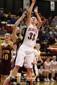 Ellsworth Lady Bearcat Lainey Dunn (#33) goes up for a shot against the Victoria Lady Knights at the 2012 Hoisington Winter Jam Basketball Tournament.