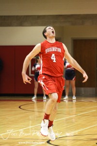 Hoisington Cardinal Cody Stetler (#4) celebrates after dunking the ball on the Minneapolis Lions at the 2012 Hoisington Winter Jam Basketball Tournament.