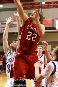 Hoisington Cardinal Anthony Broeder (#22) goes up for a shot against the Minneapolis Lions at the 2012 Hoisington Winter Jam Basketball Tournament.