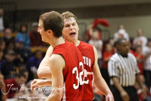 Hoisington Cardinals Anthony Broeder (#22) and Derrick Kaiser (#32)celebrate winning the 2012 Hoisington Winter Jam Basketball Tournament Boys Championship.
