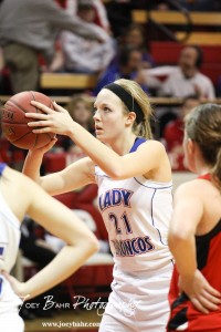 Russell Lady Bronco Kelli Rourke (#21) takes a free throw against the Hoisington Lady Cardinal at the 2012 Hoisington Winter Jam Basketball Tournament.