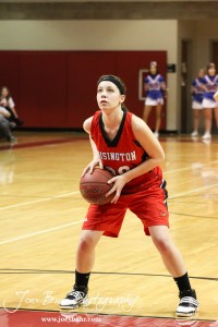 Brandy Wondra (#20) of the Hoisington Lady Cardinals prepares to shoot a free throw against the Russell Lady Broncos at the 2012 Hoisington Winter Jam Basketball Tournament.
