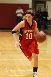 Jordin Greer (#10) of the Hoisington Lady Cardinals drives towards the Russell Lady Broncos defense at the 2012 Hoisington Winter Jam Basketball Tournament.
