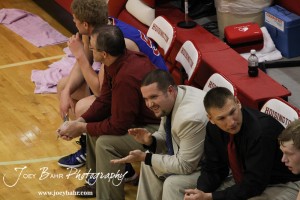 Ellinwood Eagles Head Coach Shane Duncan encourages his players against the LaCrosse Leopards at the 2012 Hoisington Winter Jam Basketball Tournament.