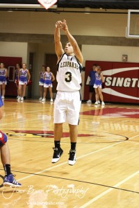 Derrick Depperschmidt (#3) of the LaCrosse Leopards takes a three point shot against the Ellinwood Eagles at the 2012 Hoisington Winter Jam Basketball Tournament.