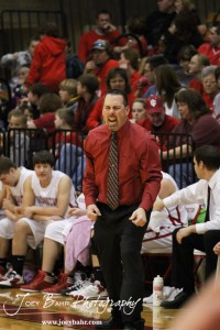 Hoisington Cardinal Head Coach Kyle Haxton yells in an instruction to his team against the Ellinwood Eagles at the Hoisington Activities Center in Hoisington, Kansas on February 10, 2012.  Photo: Joey Bahr