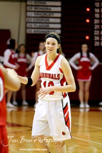 Hoisington Lady Cardinal Jordin Greer (#10) looks for a teammate to pass to against the Ellinwood Lady Eagles at the Hoisington Activities Center in Hoisington, Kansas on February 10, 2012.  Photo: Joey Bahr