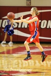 Ellinwood Lady Eagle Brooke Panning (#14) passes the ball to a teammate at the Hoisington Activities Center in Hoisington, Kansas on February 10, 2012.  Photo: Joey Bahr