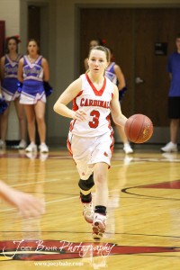 Mykela Riedl (#3) of the Hoisington Lady Cardinals drives the basketball down the court against the Ellinwood Lady Eagles at the Hoisington Activities Center in Hoisington, Kansas on February 10, 2012.  Photo: Joey Bahr
