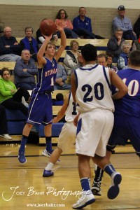 OB_Boys_vs_St_John_BB_2-21-12_0114 Otis-Bison Cougar Justus Bartonek (#1) takes a shot against the St. John Tigers at St. John High School in St. John, Kansas on February 21, 2012. Photo: Joey Bahr