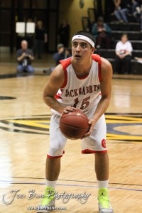 Cesar Yanez (#15) of the Greeley County Jackrabbits shoots a free throw against the Otis-Bison Cougars in the 2012 Class 1A Division II Boys State Championship Quarterfinals Game at Gross Memorial Coliseum at Fort Hays State University in Hays, Kansas on March 7, 2012.  Photo: Joey Bahr