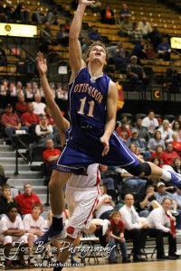 Dylan Wissman (#11) of the Otis-Bison Cougars goes up for a layup against the Greeley County Jackrabbits in the 2012 Class 1A Division II Boys State Championship Quarterfinals Game at Gross Memorial Coliseum at Fort Hays State University in Hays, Kansas on March 7, 2012.  Photo: Joey Bahr