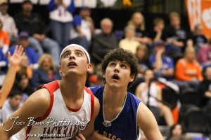 Greeley County Jackrabbit Cesar Yanez (#15) and Otis-Bison Cougar Brandon Pechanec (#44) watch the basketball during a free throw attempt in the 2012 Class 1A Division II Boys State Championship Quarterfinals Game at Gross Memorial Coliseum at Fort Hays State University in Hays, Kansas on March 7, 2012.  Photo: Joey Bahr