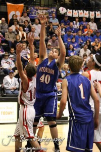Tyler Maier (#40) of the Otis-Bison Cougars takes a shot against the Greeley County Jackrabbits in the 2012 Class 1A Division II Boys State Championship Quarterfinals Game at Gross Memorial Coliseum at Fort Hays State University in Hays, Kansas on March 7, 2012.  Photo: Joey Bahr