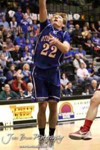 Otis-Bison Cougar Patrick Piper (#22) goes for a layup against the Greeley County Jackrabbits in the 2012 Class 1A Division II Boys State Championship Quarterfinals Game at Gross Memorial Coliseum at Fort Hays State University in Hays, Kansas on March 7, 2012.  Photo: Joey Bahr