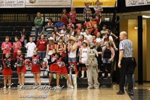 Greeley County Jackrabbit students cheer on their players against the Otis-Bison Cougars in the 2012 Class 1A Division II Boys State Championship Quarterfinals Game at Gross Memorial Coliseum at Fort Hays State University in Hays, Kansas on March 7, 2012.  Photo: Joey Bahr