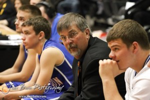 Otis-Bison Cougar Assistant Coach Don DeWald looks down the bench in the 2012 Class 1A Division II Boys State Championship Quarterfinals Game against the Greeley County Jackrabbits at Gross Memorial Coliseum at Fort Hays State University in Hays, Kansas on March 7, 2012.  Photo: Joey Bahr