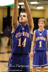 Zachary Stejskal (#14) of the Otis-Bison Cougars shoots a free throw attempt against the Greeley County Jackrabbits in the 2012 Class 1A Division II Boys State Championship Quarterfinals Game at Gross Memorial Coliseum at Fort Hays State University in Hays, Kansas on March 7, 2012.  Photo: Joey Bahr