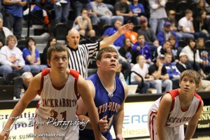 Greeley County Jackrabbit John Miller (#31) and Otis-Bison Cougar Sam Higgason (#41) watch the basketball during a free throw attempt in the 2012 Class 1A Division II Boys State Championship Quarterfinals Game at Gross Memorial Coliseum at Fort Hays State University in Hays, Kansas on March 7, 2012.  Photo: Joey Bahr
