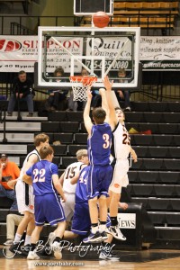 2012 Class 1A Division II Boys State Championship Semifinals Otis-Bison Cougar Trevor Keller (#3) takes a three-point shot against the Hope Lions in the 2012 Class 1A Division II Boys State Championship Semifinals Game at Gross Memorial Coliseum at Fort Hays State University in Hays, Kansas on March 9, 2012. Photo: Joey Bahr