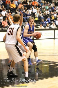 2012 Class 1A Division II Boys State Championship Semifinals Otis-Bison Cougar Dylan Wissman (#11) jumps into the lane against the Hope Lions in the 2012 Class 1A Division II Boys State Championship Semifinals Game at Gross Memorial Coliseum at Fort Hays State University in Hays, Kansas on March 9, 2012. Photo: Joey Bahr