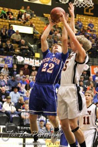 2012 Class 1A Division II Boys State Championship Semifinals Patrick Piper (#22) of the Otis-Bison Cougars goes up for a layup against the Hope Lions in the 2012 Class 1A Division II Boys State Championship Semifinals Game at Gross Memorial Coliseum at Fort Hays State University in Hays, Kansas on March 9, 2012. Photo: Joey Bahr