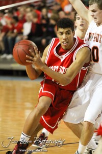 Tyler Adams (#15) of the Fort Scott Tigers drives into the lane against the Abilene Cowboys in the 2012 Class 4A Boys State Championship Quarterfinals Game at Salina Bicentennial Center in Salina, Kansas on March 8, 2012.  Photo: Joey Bahr