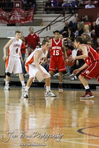 Fort Scott Tiger Cameron Woodring (#24) drives towards Abilene Cowboy Collin Sexton (#10) in the 2012 Class 4A Boys State Championship Quarterfinals Game at Salina Bicentennial Center in Salina, Kansas on March 8, 2012.  Photo: Joey Bahr