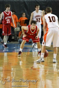 Johnathan Stark (#3) of the Fort Scott Tigers watches Abilene Cowboy Matthew Barlow (#3) in the 2012 Class 4A Boys State Championship Quarterfinals Game at Salina Bicentennial Center in Salina, Kansas on March 8, 2012.  Photo: Joey Bahr