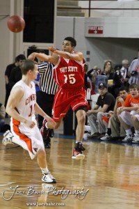 Fort Scott Tiger Tyler Adams (#15) passes the basketball to a teammate against the Abilene Cowboys in the 2012 Class 4A Boys State Championship Quarterfinals Game at Salina Bicentennial Center in Salina, Kansas on March 8, 2012.  Photo: Joey Bahr
