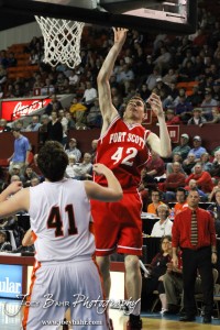 Kyle Altic (#42) of the Fort Scott Tigers goes up for a shot over Abilene Cowboy Jacob Harms (#41) in the 2012 Class 4A Boys State Championship Quarterfinals Game at Salina Bicentennial Center in Salina, Kansas on March 8, 2012.  Photo: Joey Bahr