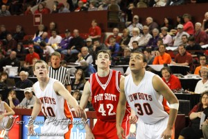 Abilene Cowboys Collin Sexton (#10) and Adrian Polk (#30) along with Fort Scott Tiger Kyle Altic (#42) watch a free throw attempt in the 2012 Class 4A Boys State Championship Quarterfinals Game at Salina Bicentennial Center in Salina, Kansas on March 8, 2012.  Photo: Joey Bahr