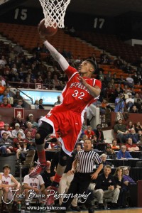 Travell Robinson (#32) of the McPherson Bullpups goes up for a layup against the Ottawa Cyclones in the 2012 Class 4A Boys State Championship Quarterfinals Game at Salina Bicentennial Center in Salina, Kansas on March 8, 2012.  Photo: Joey Bahr
