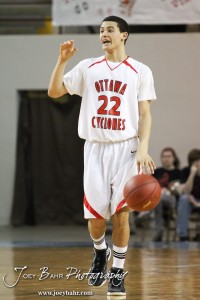 Ottawa Cyclone Dallas Natt (#22) calls out a play against the McPherson Bullpups in the 2012 Class 4A Boys State Championship Quarterfinals Game at Salina Bicentennial Center in Salina, Kansas on March 8, 2012.  Photo: Joey Bahr
