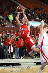 Chase Miller (#14) of the McPherson Bullpups takes a shot against the Ottawa Cyclones in the 2012 Class 4A Boys State Championship Quarterfinals Game at Salina Bicentennial Center in Salina, Kansas on March 8, 2012.  Photo: Joey Bahr
