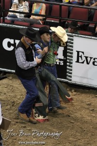 Championship Bull Riding Roto-Mix Dodge City Shootout Francisco Morales is helped off by members of the sports medicine staff after his Championship Round ride in the Championship Bull Riding Roto-Mix Dodge City Shootout at United Wireless Arena in Dodge City, Kansas on March 17, 2012. Photo: Joey Bahr