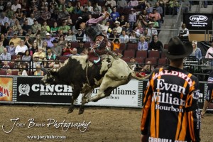 Championship Bull Riding Roto-Mix Dodge City Shootout Josh Barentine flies high during his Championship Round ride in the Championship Bull Riding Roto-Mix Dodge City Shootout at United Wireless Arena in Dodge City, Kansas on March 17, 2012. Photo: Joey Bahr